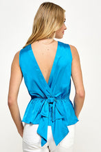 Cerulean Blue Sleeveless Peplum Top With Bow In Back