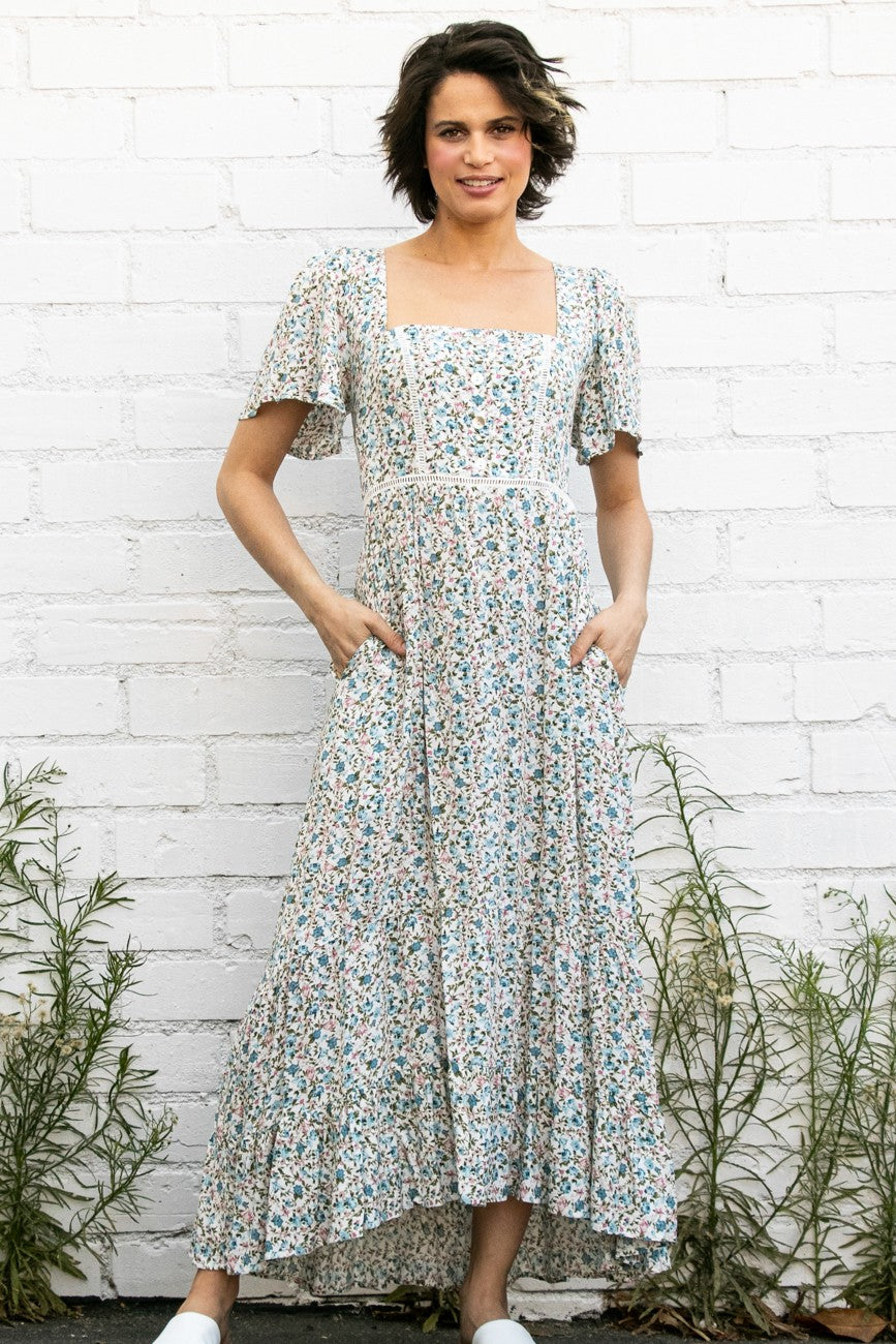 Cream Flutter Sleeve Floral Flowy Maxi Dress Aquarius Brand Cream Flutter Sleeve Floral Flowy Maxi Dress Aquarius Brand
