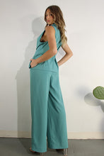 Turiquoise Sleeveless Jacket And Pants Set