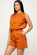 Orange Sleeveless Top And Shorts