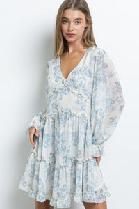 White Long Sleeve Butterfly Bust Dress In A Floral Print