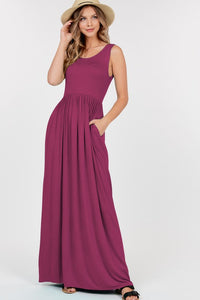Fuchsia Sleeveless Maxi Dress With Empire Waist Shirring And Pockets