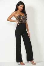 Black Solid, Full Length Pants In A Flare Style With A High Waist, And Wide Legs